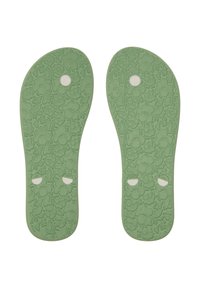 Plantillas de goma verde para zapatos con un patrón floral texturizado. Incluyen acentos circulares blancos y recortes para un ajuste ajustable.