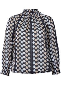 Blouse noire transparente avec de longues manches, un col rond et une finition froncée. Présente un motif d'hexagones clairs et foncés dans des tons beige et bleu.