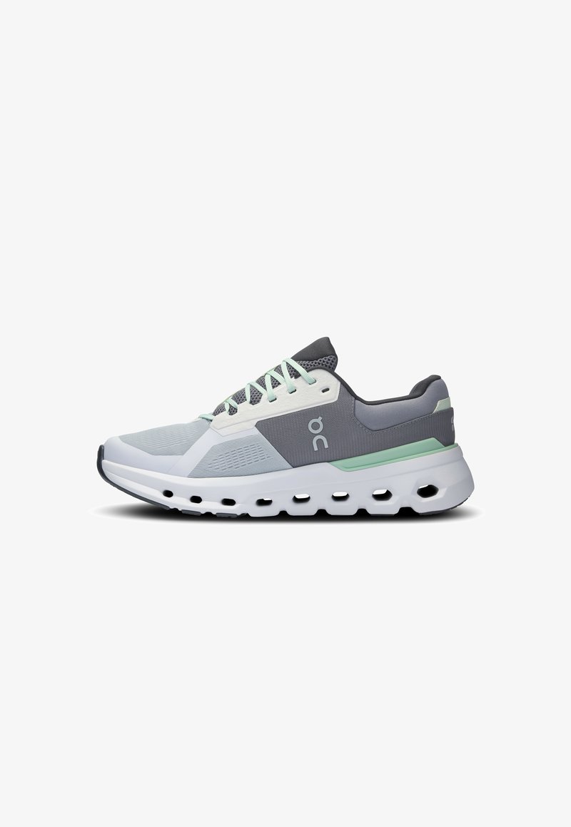 Lightweight running shoe with a breathable gray mesh upper, white midsole, mint green accents, and hollowed-out outsole for cushioning.