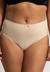 Mutandine beige a vita alta con tessuto liscio, dotate di un piccolo fiocco decorativo nella parte anteriore. Finissaggio morbido e cintura rialzata.