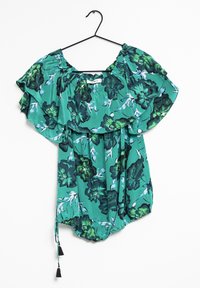 Blusa verde a fantasia floreale con maniche a volant, collo elasticizzato e orlo con coulisse e pon pon. Realizzata in tessuto leggero.