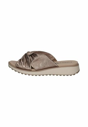 Metallic bronze slide sandals with twisted front design, cushioned footbed, and sculpted white sole featuring textured grip.