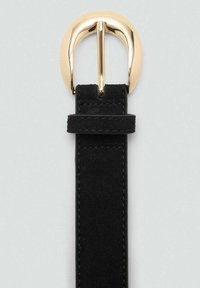Black suede belt featuring a large gold-tone round buckle, with visible stitching along the strap and a smooth, matte texture.