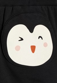 Lindex TROUSERS PENGUIN AT BACK - Hlače - off black