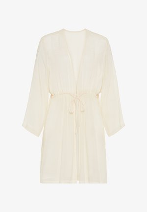 Gaisma, krēmbalti halāti ar brīvu piegriezumu, dziļu V veida kakla izgriezumu un trīs ceturtdaļu piedurknēm. Satur vidukļa sašaurināšanu ar sasienamu detaļu.