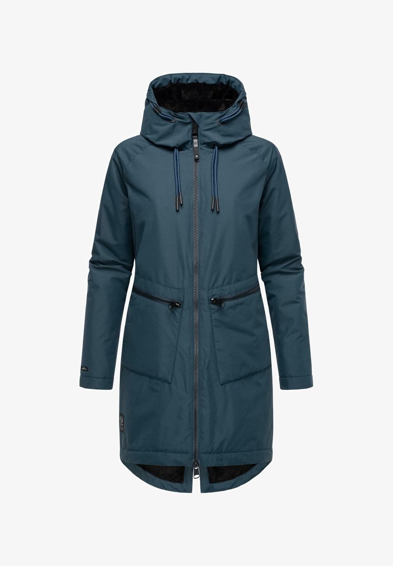 Tamnozelena, vodonepropusna parka s kapuljačom, dva zatvorena džepa s patentnim zatvaračem i prednjim zatvaračem. Ima uže na vratu i teksturiranu podstavu.