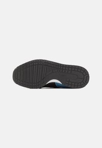 Puma CABANA RACER 20 UNISEX - Sportcipő - white/black/blue horizon/maple syrup