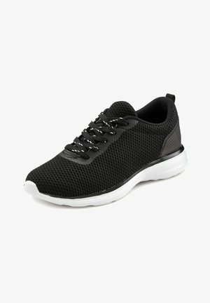 Schwarzer Sportschuh aus Mesh-Material mit weißer Sohle. Verfügt über eine strukturierte Oberseite, Schnürverschluss und dezente seitliche Akzente zur Unterstützung.