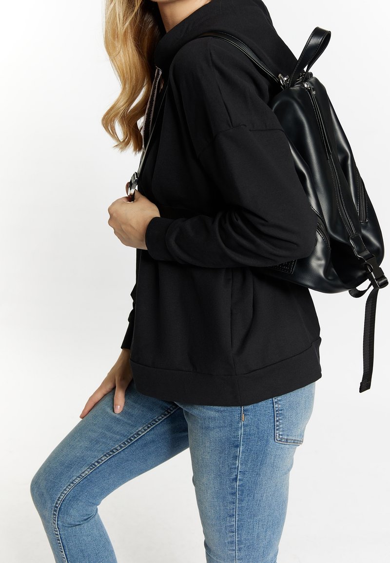 usha Dagryggsäck - black