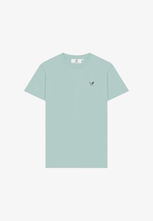 T-shirt vert clair à col rond avec manches courtes et petit logo noir représentant une rame croisée et une pagaie sur le côté gauche de la poitrine.