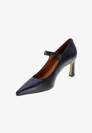 Mary Jane nera in pelle con tacco alto, punta appuntita e sottile cinturino sulla parte superiore del piede, interno della suola beige.