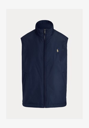 Mörkblå ärmlös väst i lätt tyg, med hög krage, frontdragkedja och liten broderad logga på vänster bröst.