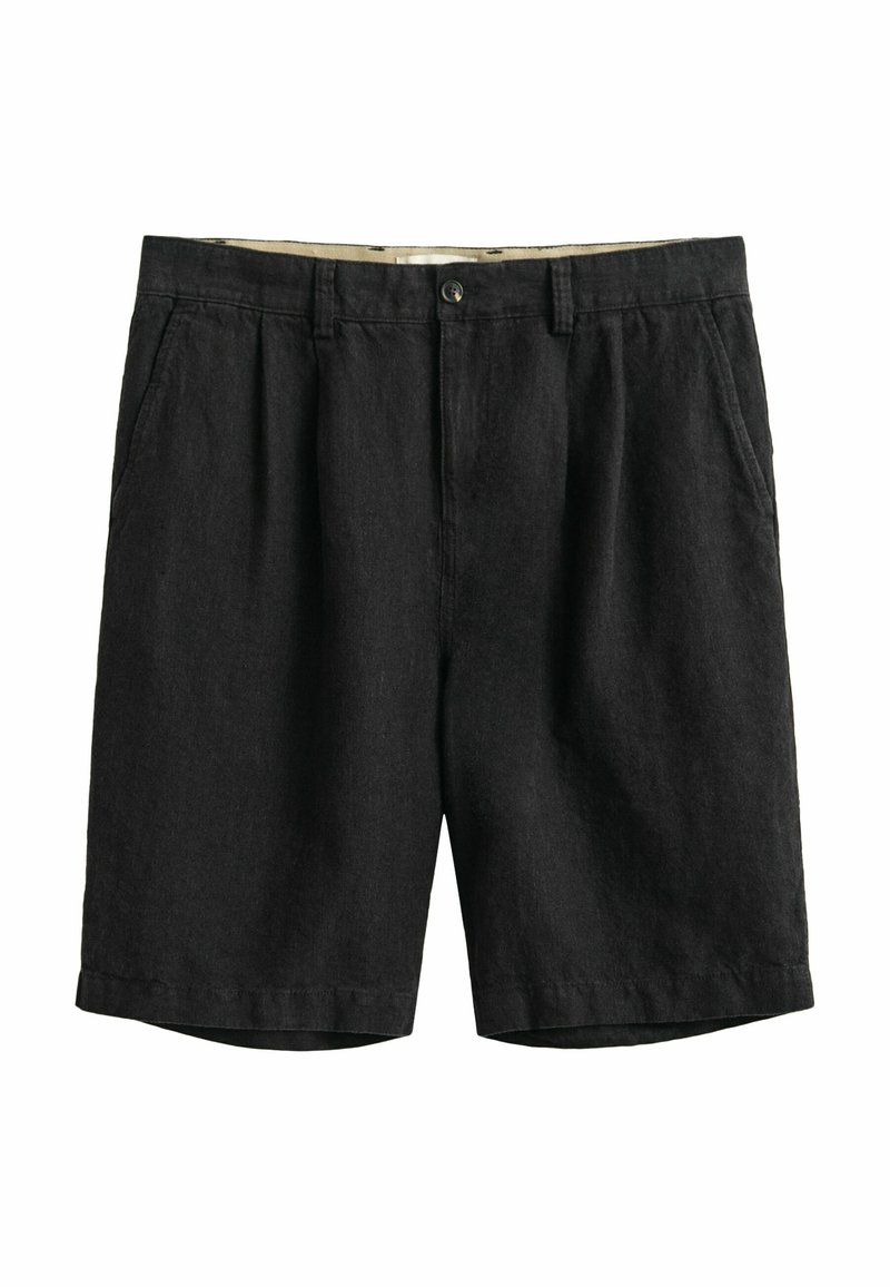 Pantalones cortos casuales negros con cierre de botón, presillas para cinturón, bolsillos laterales y una tela ligeramente texturizada sobre un fondo blanco.