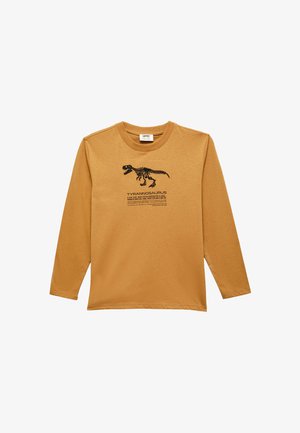 Langärmliges Shirt aus senfgelbem Baumwollstoff mit einem schwarzen Tyrannosaurus-Skeletgrafik und Text darunter. Rundhalsausschnitt, lockere Passform.