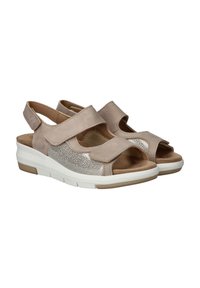 Beige open-toe sandalen met verstelbare banden, gecushioneerde voetbedden, textured zijpanelen en witte wigzolen.