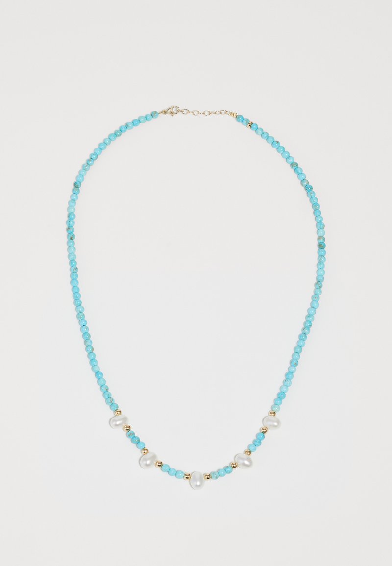 Turquoise beaded necklace with gold accents and irregular white pearls, featuring a simple design and clasp closure.