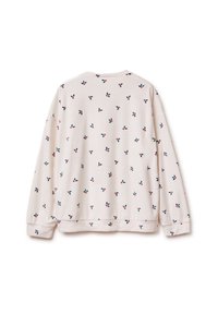 Bluza z długim rękawem w jasnobeżowym materiale z drobnymi czerwonymi i zielonymi wzorami kwiatowymi. Posiada ściągacze przy mankietach oraz luźny krój.