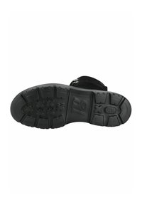 Suela de zapato negra con una superficie de goma texturizada, que presenta un patrón de relieve para mayor agarre y el número "10" grabado cerca del talón.