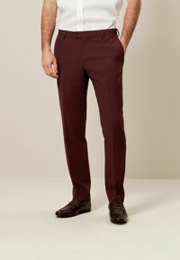 Next MOTIONFLEX - Pantalon - brick red