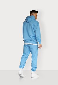 ESTEEM LETTERING OVERSIZED - Kapuzenpullover - azure