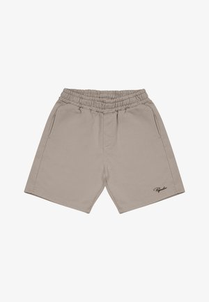 Shorts en coton beige avec une taille élastique, poches latérales et un seul logo brodé en noir sur le bas du côté gauche.