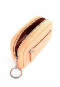 Peach leather wallet with a smooth texture, rectangular shape, dual zippers, and a keyring attachment. Interior is lined in a matching color.