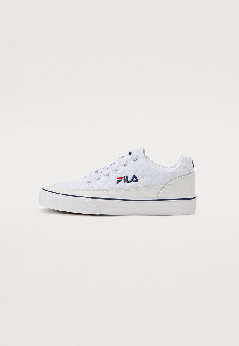 White FILA sneakers with a quilted textile upper, flat laces, padded collar, rubber sole, and subtle blue accents along the midsole.