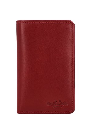 Red leather wallet with a smooth texture, rounded corners, and embossed "Gusti Leder studio" branding at the bottom right.