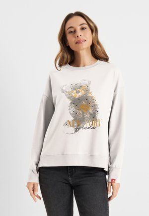 Lichtgrijze sweatshirt met een berenafbeelding en de tekst "NEW YORK", met een relaxte pasvorm, ronde hals en geribbelde manchetten.