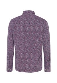 Chemise à manches longues avec un petit motif abstrait violet, rose et blanc, vue de dos sur fond blanc.