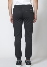 Koroshi JOGGING  - Tepláky - black