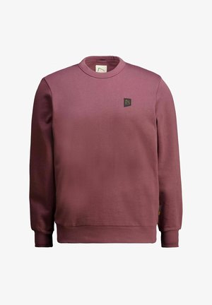 Bordeaux huppari, jossa on pyöreä kaula-aukko, pitkät hihat ja pieni musta logo-patch rintaan. Valmistettu sileästä, pehmeästä kankaasta.