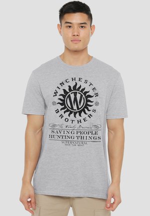 Warner Brothers, SUPERNATURAL/WINCHESTER ANTI POSSESSION - Print T-shirt - mottled light grey