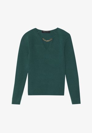 Green ribbed knit sweater with long sleeves and a V-neckline, featuring a gold chain accent at the neckline.