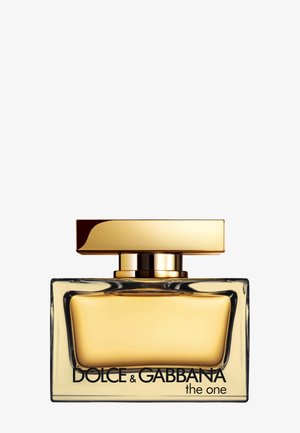 Flacon de parfum rectangulaire en verre avec liquide doré et large bouchon plat doré marqué Dolce & Gabbana the one.