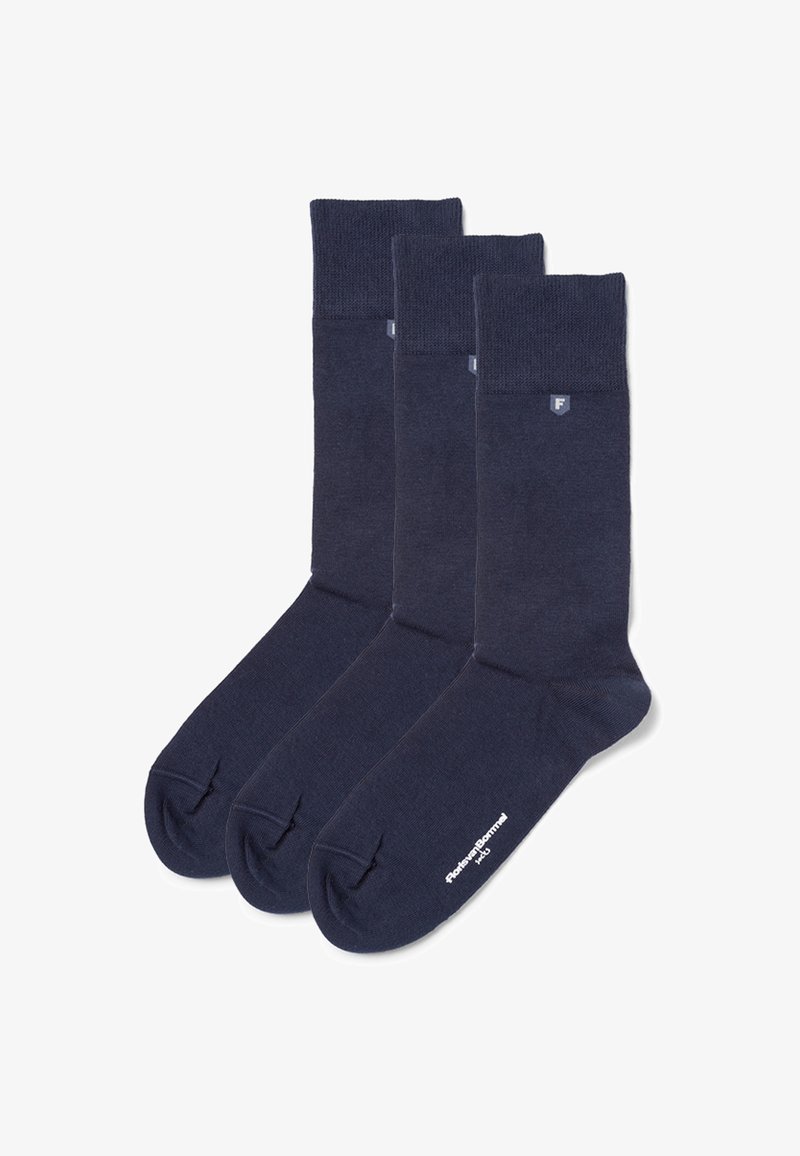 Chaussettes en coton bleu marine avec poignets côtelés et orteils renforcés, avec un petit logo et une texture lisse. Lot de trois.