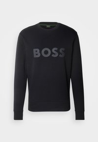 Zwarte sweatshirt met een ronde hals en lange mouwen. De voorkant toont een verhoogd, glanzend 'BOSS' logo in het midden.