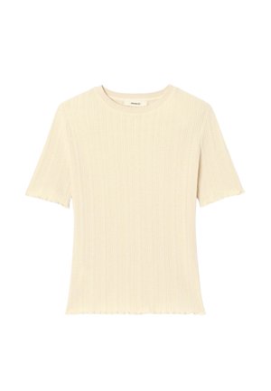Haut à manches courtes en maille côtelée couleur crème avec encolure ronde et bords subtilement festonnés aux manches et à l'ourlet.