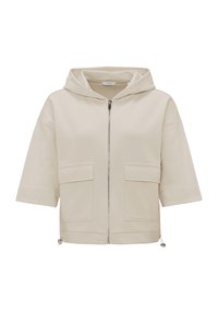 Felpa corta beige chiaro con maniche corte, chiusura frontale a zip, due ampie tasche a toppa, orlo con cordoncino e texture morbida.