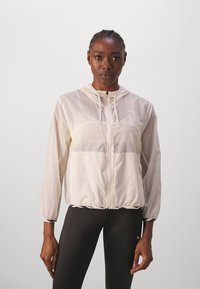 Puma ANIMAL REMIX FASHION - Trainingsvest - sugared almond