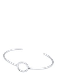 Bracelet jonc en argent avec une finition lisse et polie. Présente une découpe circulaire au centre, avec des extrémités fines et courbées.