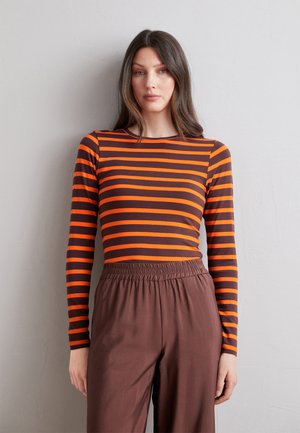 Long-sleeve top featuring horizontal stripes in orange and dark brown, paired with elastic-waist brown trousers. Smooth fabric texture.