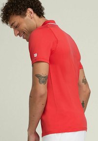 Wilson PLAYERS TEAM - Polo - infrared