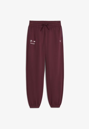 Maroon track pants with an elastic waistband and drawstring, featuring BMW Motorsport and Puma logos printed in white.