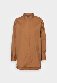 Brązowa koszula na długi rękaw z guzikami, wykonana z gładkiej tkaniny. Posiada klasyczny kołnierzyk, krytą plisę oraz lekko zaokrąglony dół.