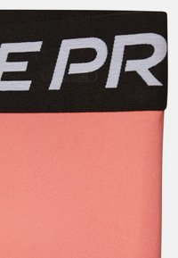 Nike Performance UNISEX - Leggings - Calças - pink salt/ white