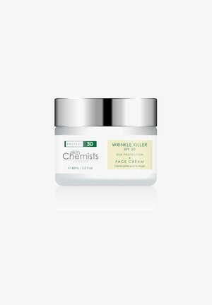 White jar with a silver lid labeled "Wrinkle Killer SPF 30" for sun protection. Size: 60 mL. Smooth surface, minimalistic design, green accents.