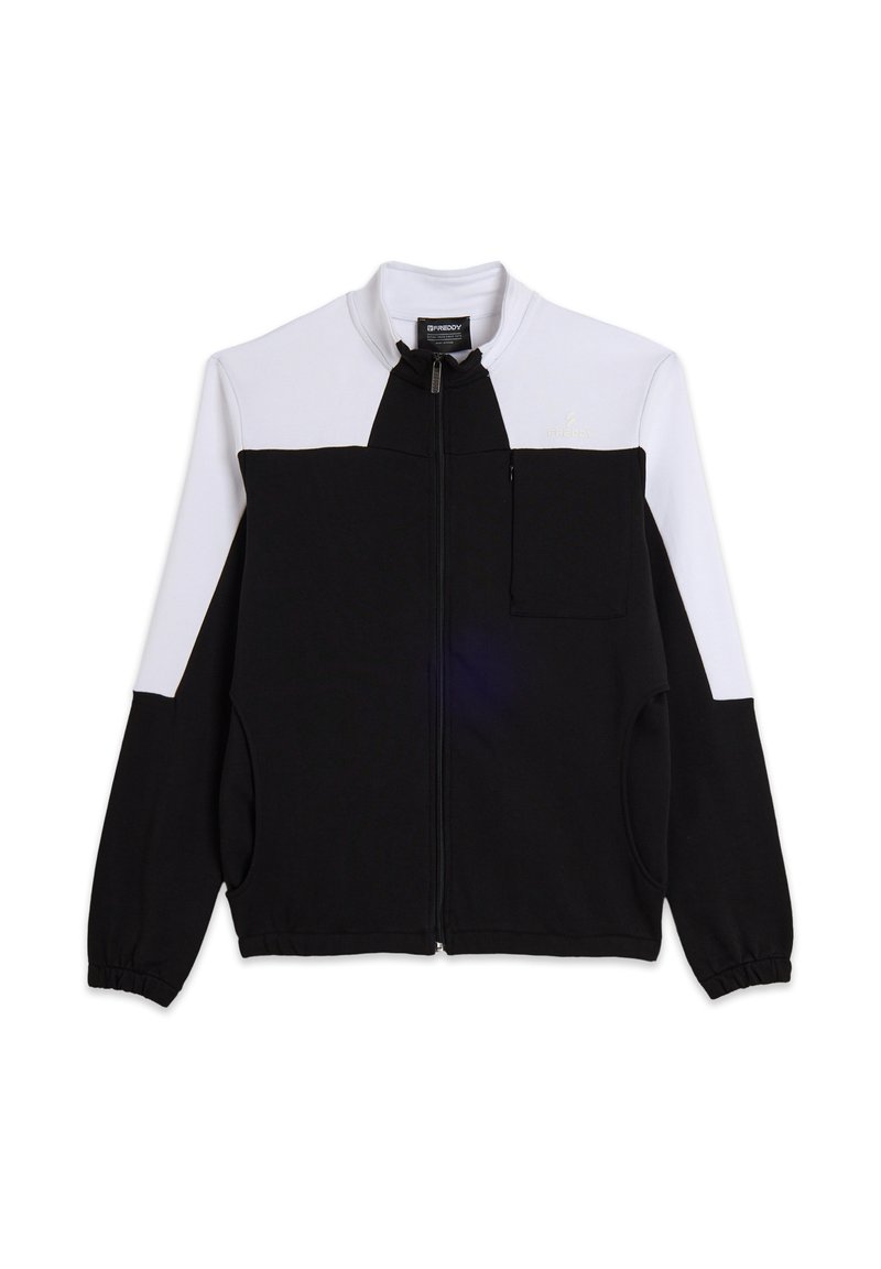 Chaqueta negra y blanca con cremallera y cuello alto, que cuenta con un bolsillo en el pecho, bolsillos laterales y puños acanalados. Fabricada con tela suave.