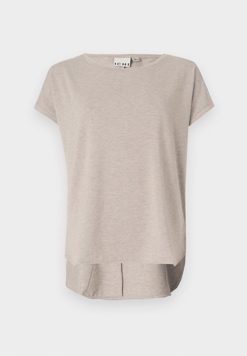 Lichtbeige T-shirt met korte mouwen, gemaakt van zachte stof. Rond halsje, ontspannen pasvorm en een iets langere achterkant met zijsplitten.