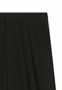 Black pleated trousers featuring a flat front, side pockets, and a smooth texture. Suitable for formal or casual wear.